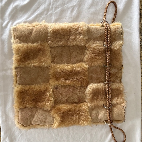 Genuine shearling patchwork drawstring bag. - Picture 1 of 4